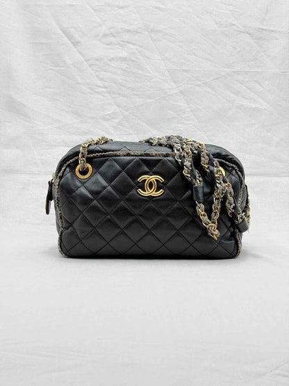 Pre - loved CHANEL Tweedy Bowler Black Quilted Shoulder Bag at Reems Closet