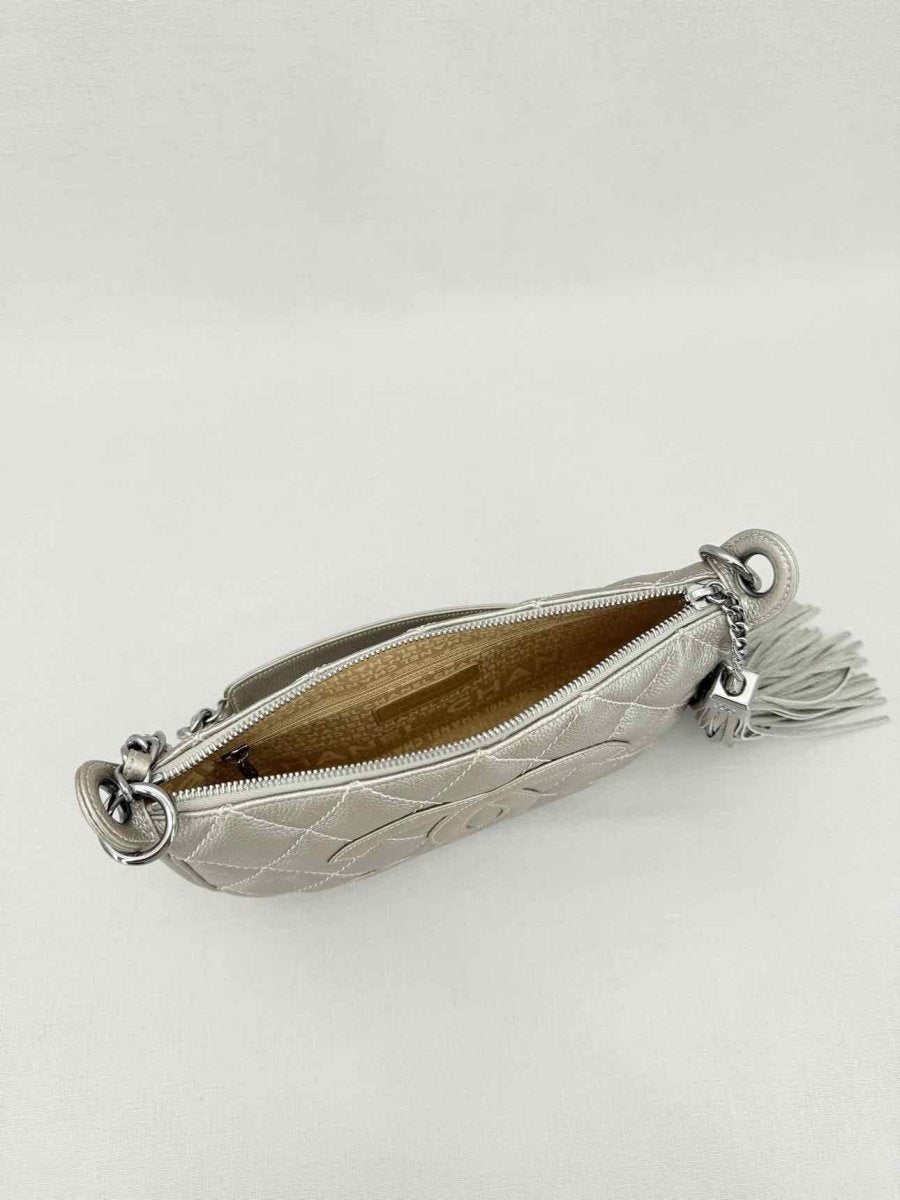 Pre - loved CHANEL Vintage Metallic Silver Quilted Shoulder Bag at Reems Closet