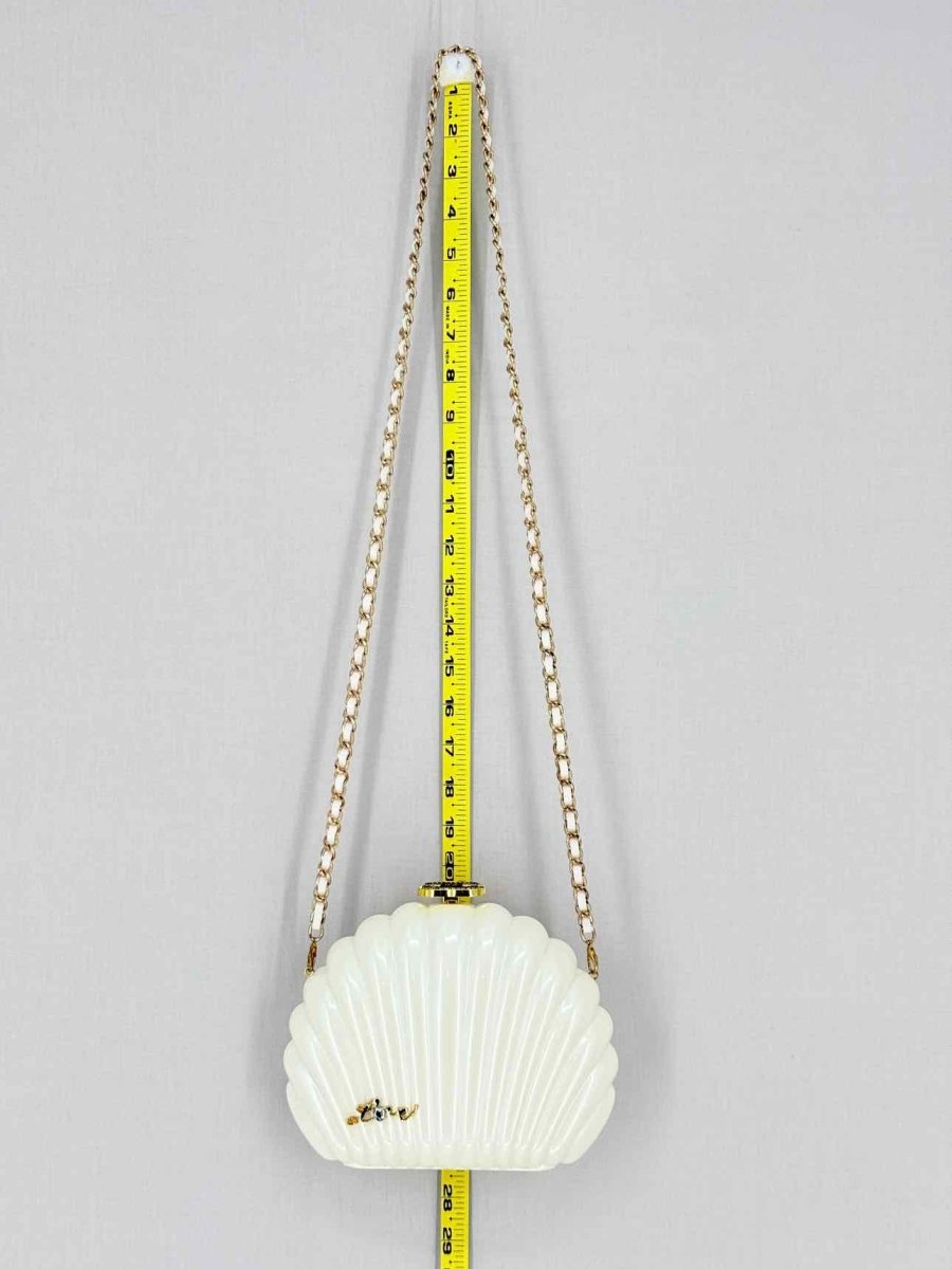 Pre - loved CHANEL VIP Limited Edition White Clutch at Reems Closet