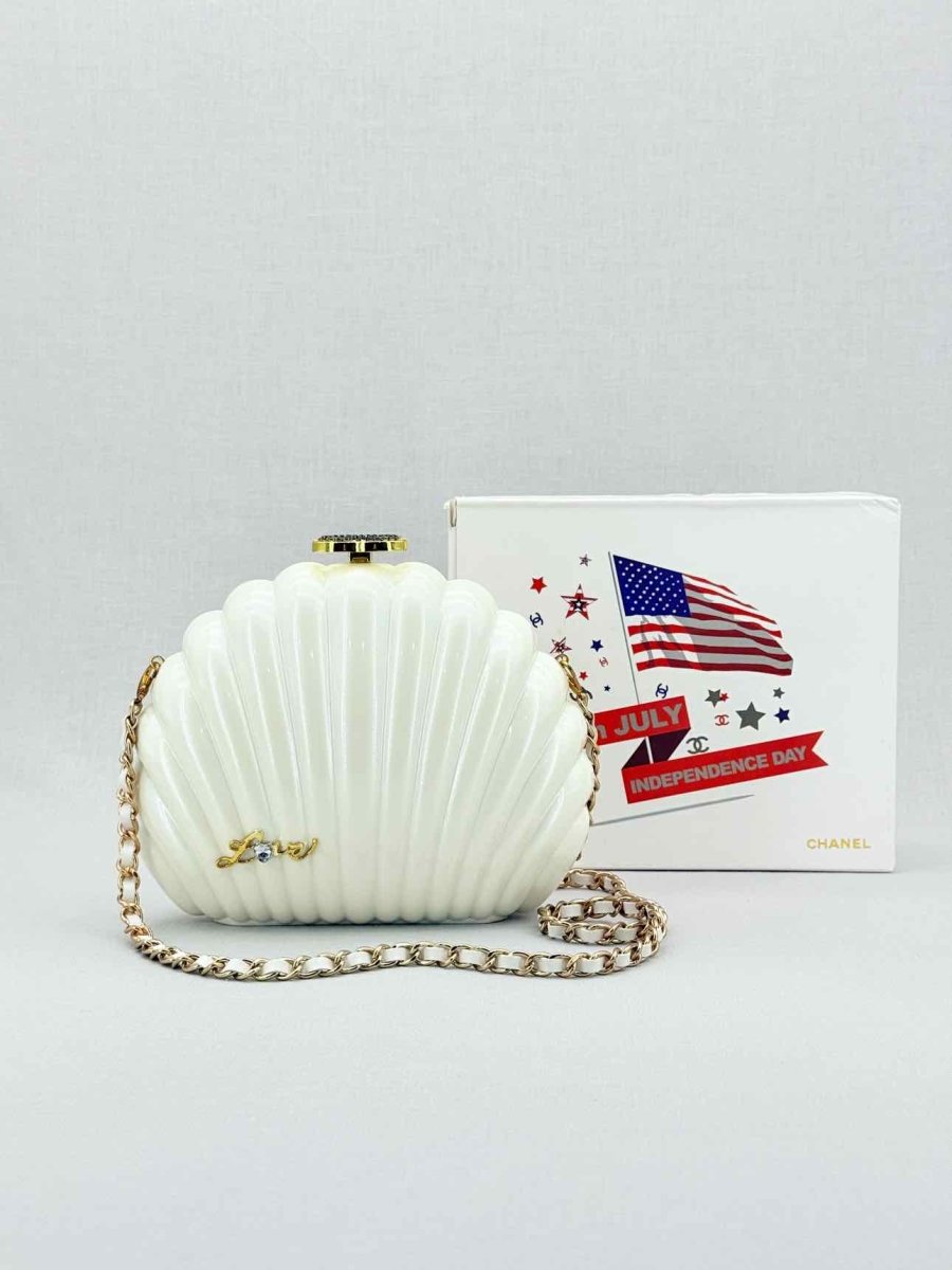 Pre - loved CHANEL VIP Limited Edition White Clutch at Reems Closet