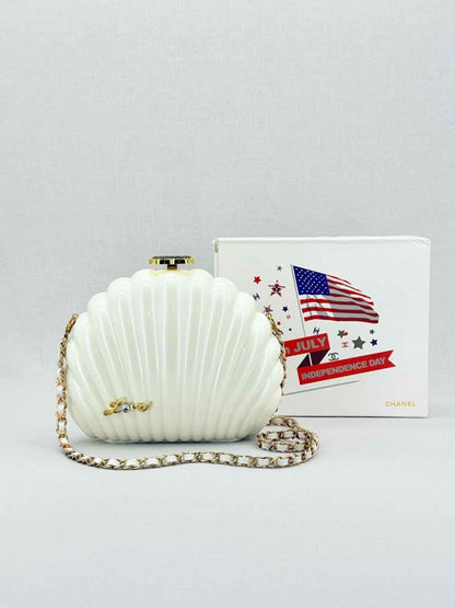 Pre - loved CHANEL VIP Limited Edition White Clutch at Reems Closet