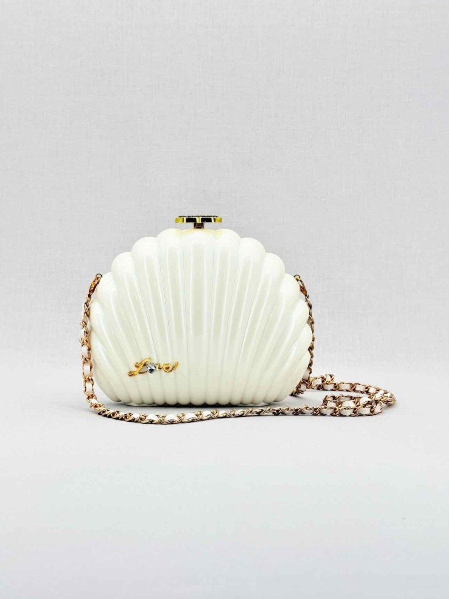 Pre - loved CHANEL VIP Limited Edition White Clutch at Reems Closet