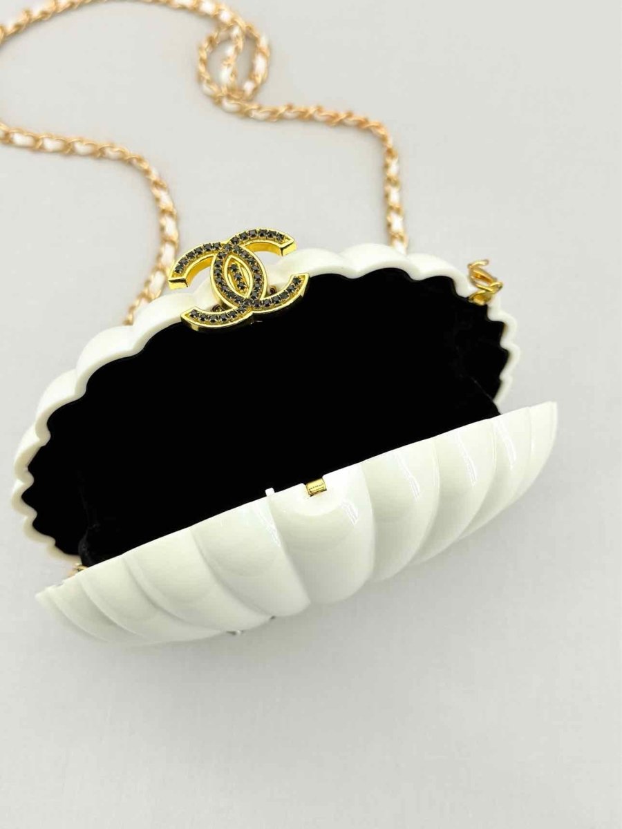 Pre - loved CHANEL VIP Limited Edition White Clutch at Reems Closet
