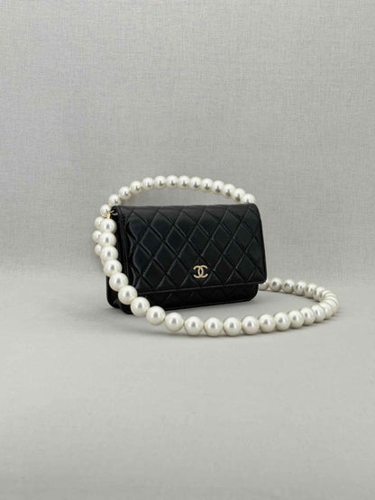 Pre - loved CHANEL Wallet on Chain Black Shoulder Bag at Reems Closet