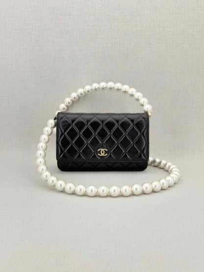 Pre - loved CHANEL Wallet on Chain Black Shoulder Bag at Reems Closet