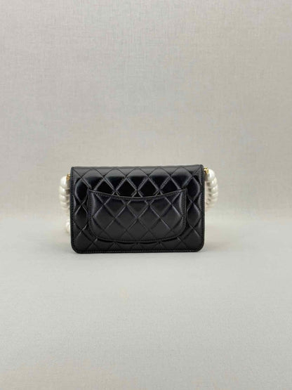 Pre - loved CHANEL Wallet on Chain Black Shoulder Bag at Reems Closet