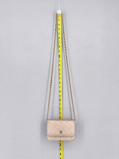 Pre-loved CHANEL Wallet on Chain Metallic Gold Quilted Crossbody at Reems Closet