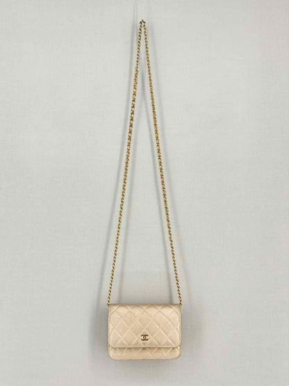 Pre-loved CHANEL Wallet on Chain Metallic Gold Quilted Crossbody at Reems Closet