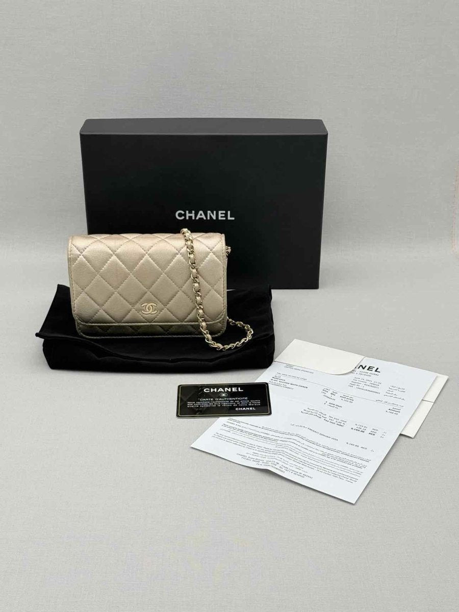 Pre-loved CHANEL Wallet on Chain Metallic Gold Quilted Crossbody at Reems Closet