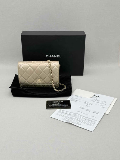 Pre-loved CHANEL Wallet on Chain Metallic Gold Quilted Crossbody at Reems Closet