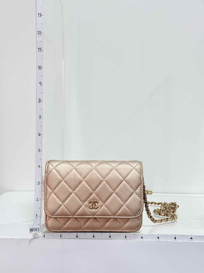 Pre-loved CHANEL Wallet on Chain Metallic Gold Quilted Crossbody at Reems Closet