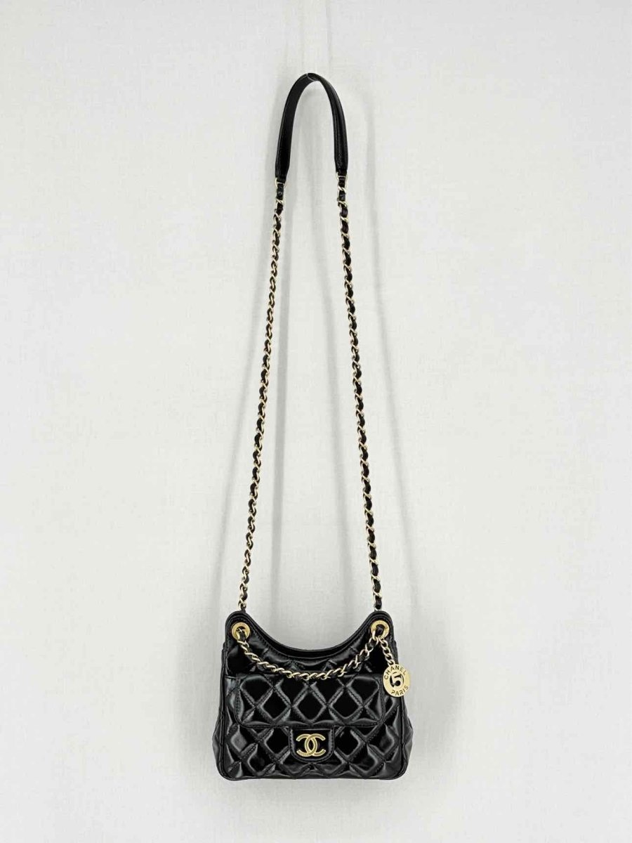 Pre - loved CHANEL Wavy CC Hobo Black Quilted Shoulder Bag at Reems Closet