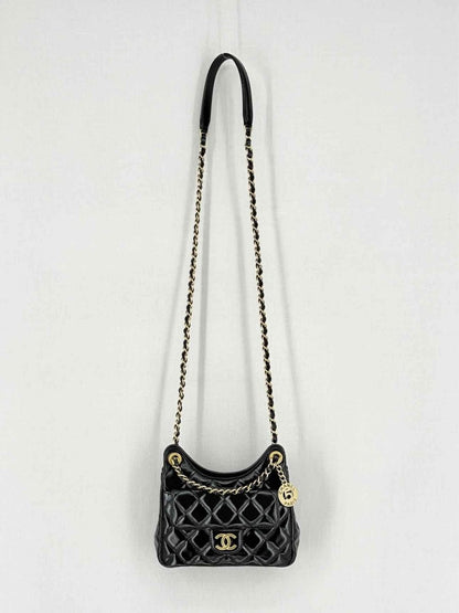 Pre - loved CHANEL Wavy CC Hobo Black Quilted Shoulder Bag at Reems Closet