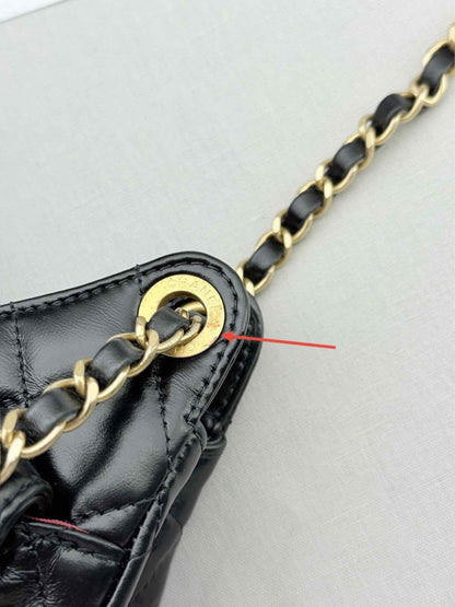 Pre - loved CHANEL Wavy CC Hobo Black Quilted Shoulder Bag at Reems Closet