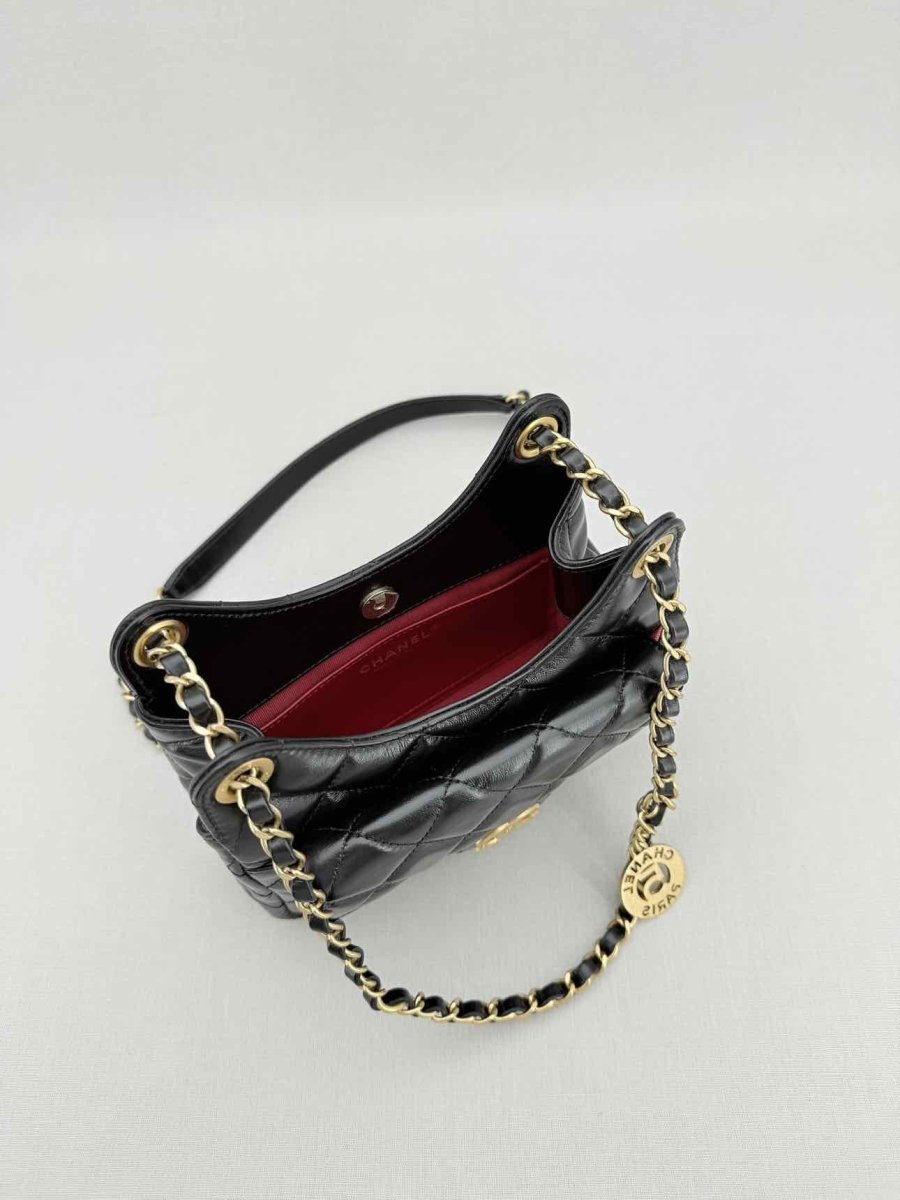 Pre - loved CHANEL Wavy CC Hobo Black Quilted Shoulder Bag at Reems Closet