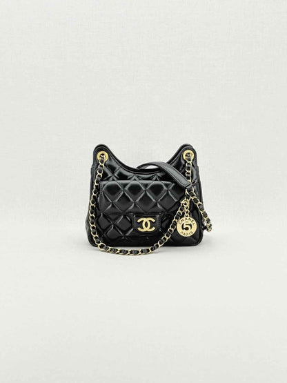 Pre - loved CHANEL Wavy CC Hobo Black Quilted Shoulder Bag at Reems Closet