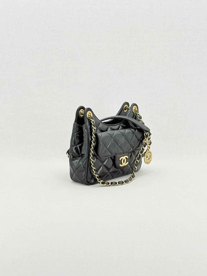 Pre - loved CHANEL Wavy CC Hobo Black Quilted Shoulder Bag at Reems Closet