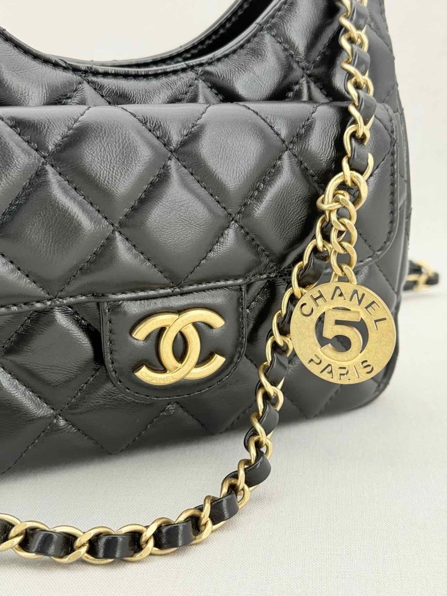 Pre - loved CHANEL Wavy CC Hobo Black Quilted Shoulder Bag at Reems Closet
