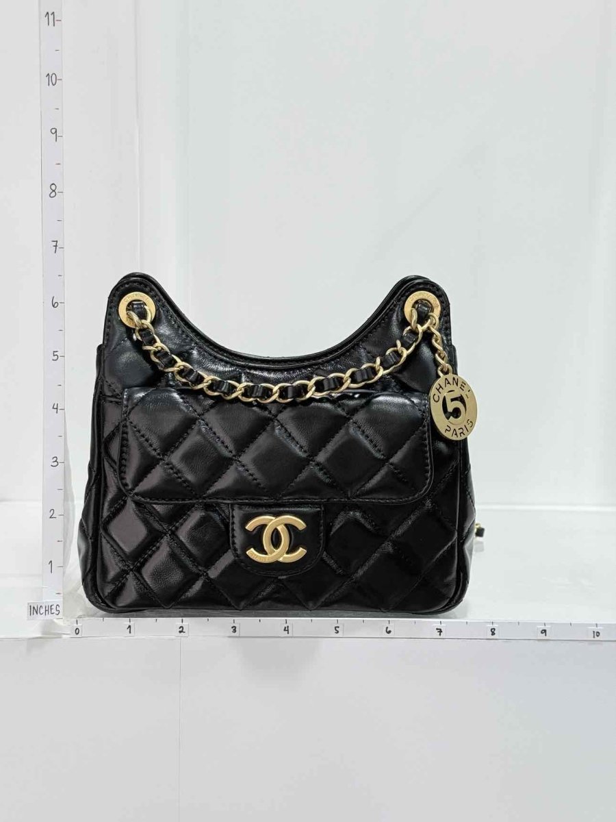 Pre - loved CHANEL Wavy CC Hobo Black Quilted Shoulder Bag at Reems Closet