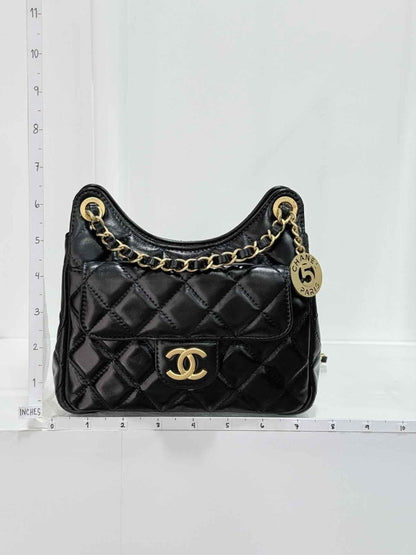 Pre - loved CHANEL Wavy CC Hobo Black Quilted Shoulder Bag at Reems Closet
