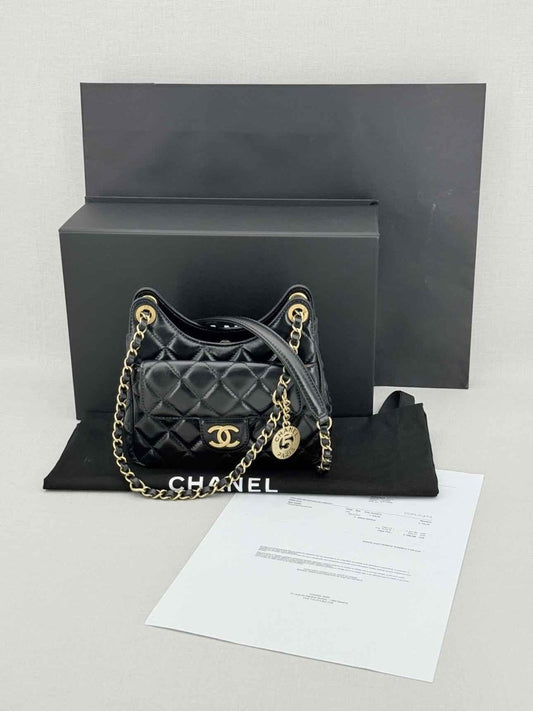 Pre - loved CHANEL Wavy CC Hobo Black Quilted Shoulder Bag at Reems Closet