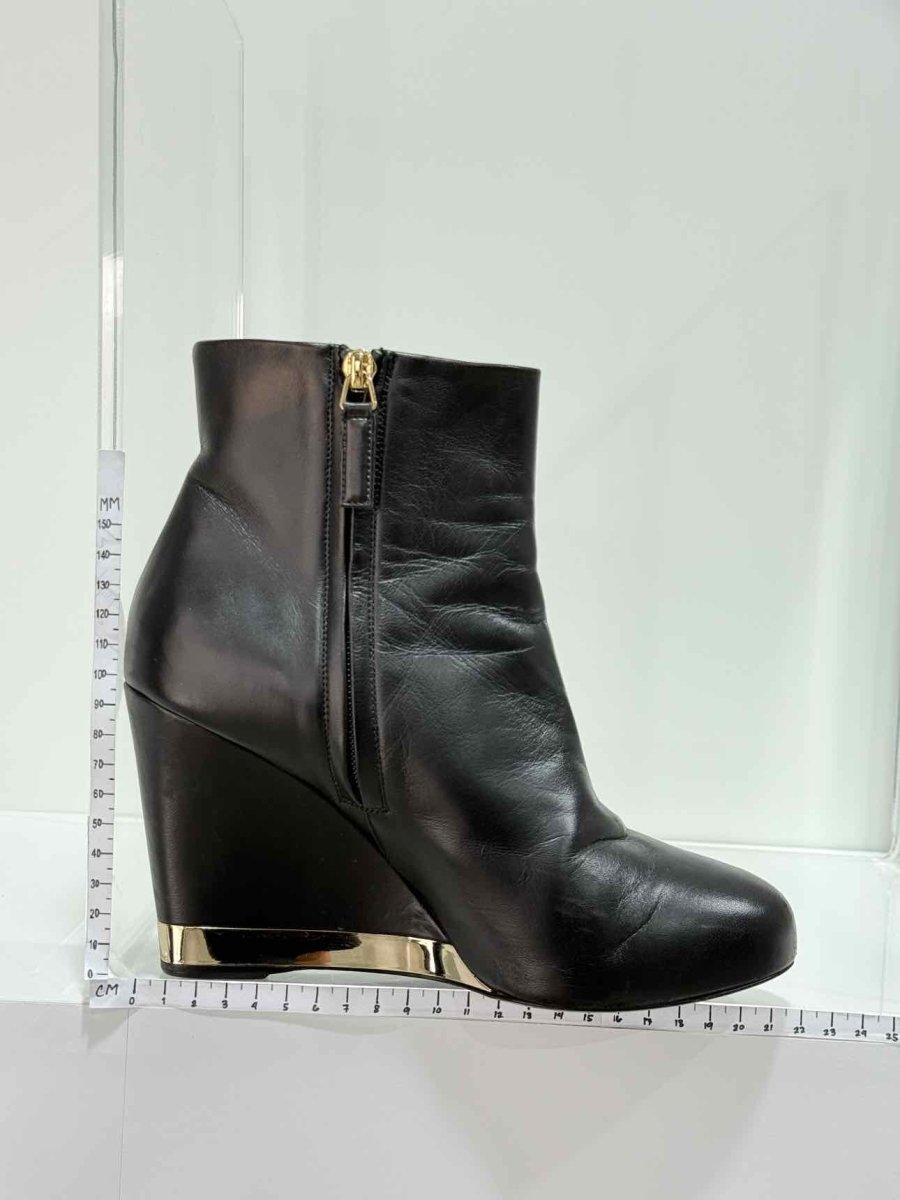 Pre - loved CHANEL Wedge Black Size EU 39 Ankle Boots at Reems Closet