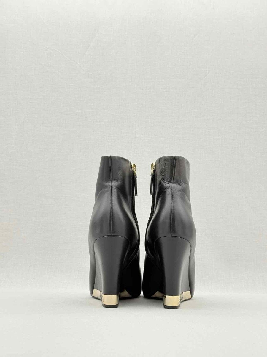 Pre - loved CHANEL Wedge Black Size EU 39 Ankle Boots at Reems Closet