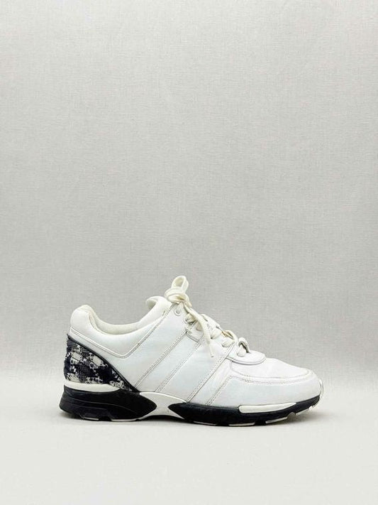 Pre-loved CHANEL White & Black Size EU 40 Sneakers at Reems Closet