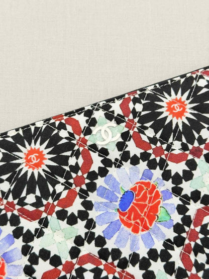 Pre-loved CHANEL White Multicolor Floral Print Pouch at Reems Closet