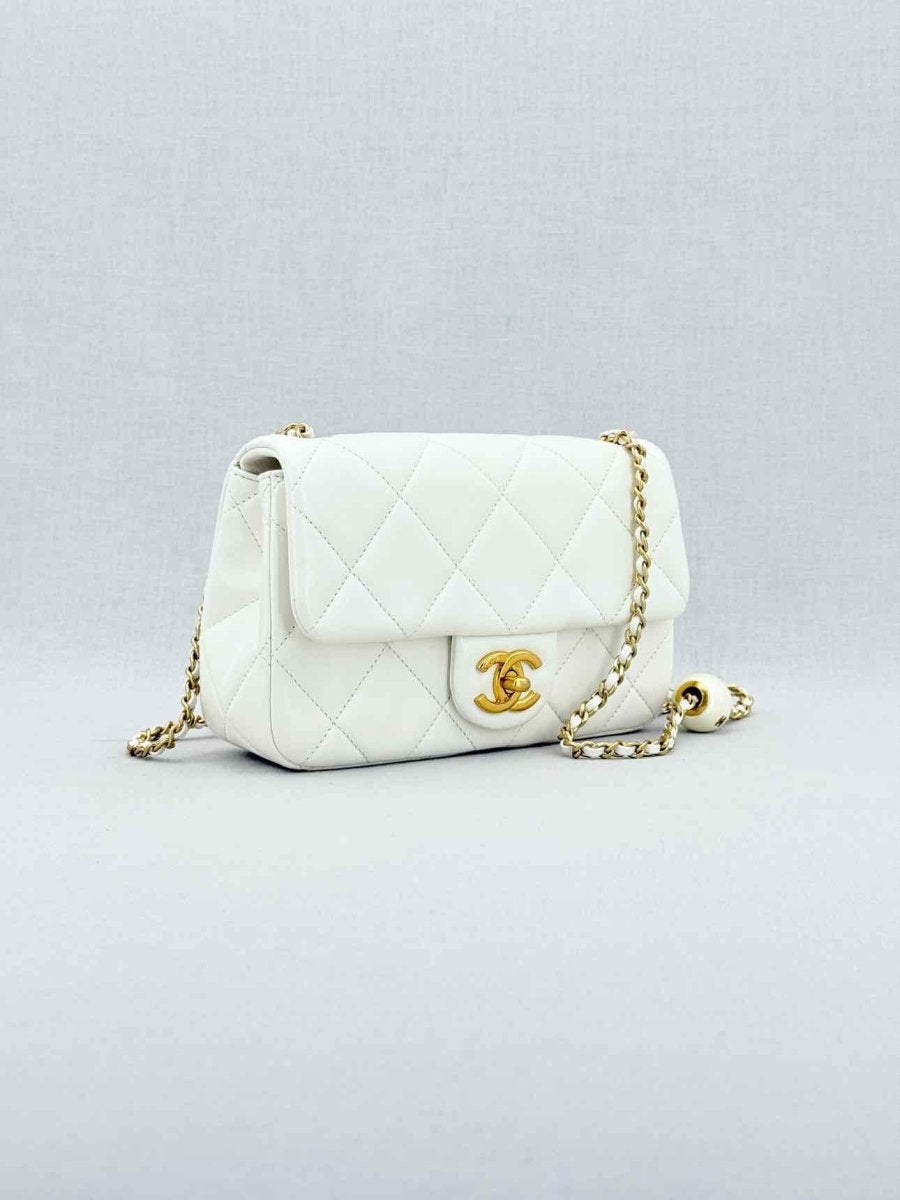 Pre - loved CHANEL White Quilted Crossbody at Reems Closet