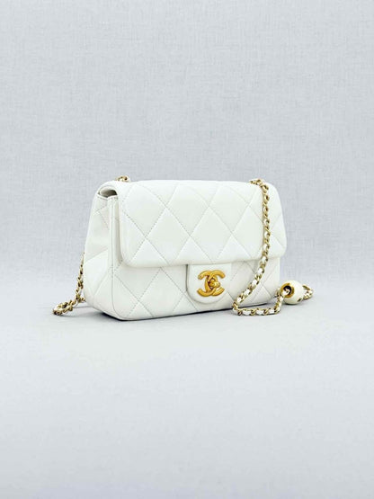 Pre - loved CHANEL White Quilted Crossbody at Reems Closet