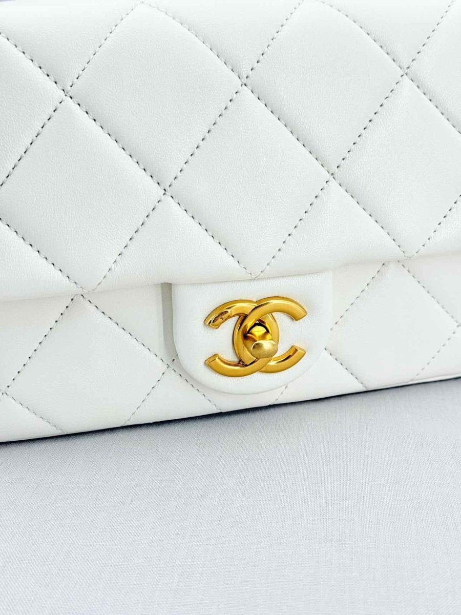 Pre - loved CHANEL White Quilted Crossbody at Reems Closet