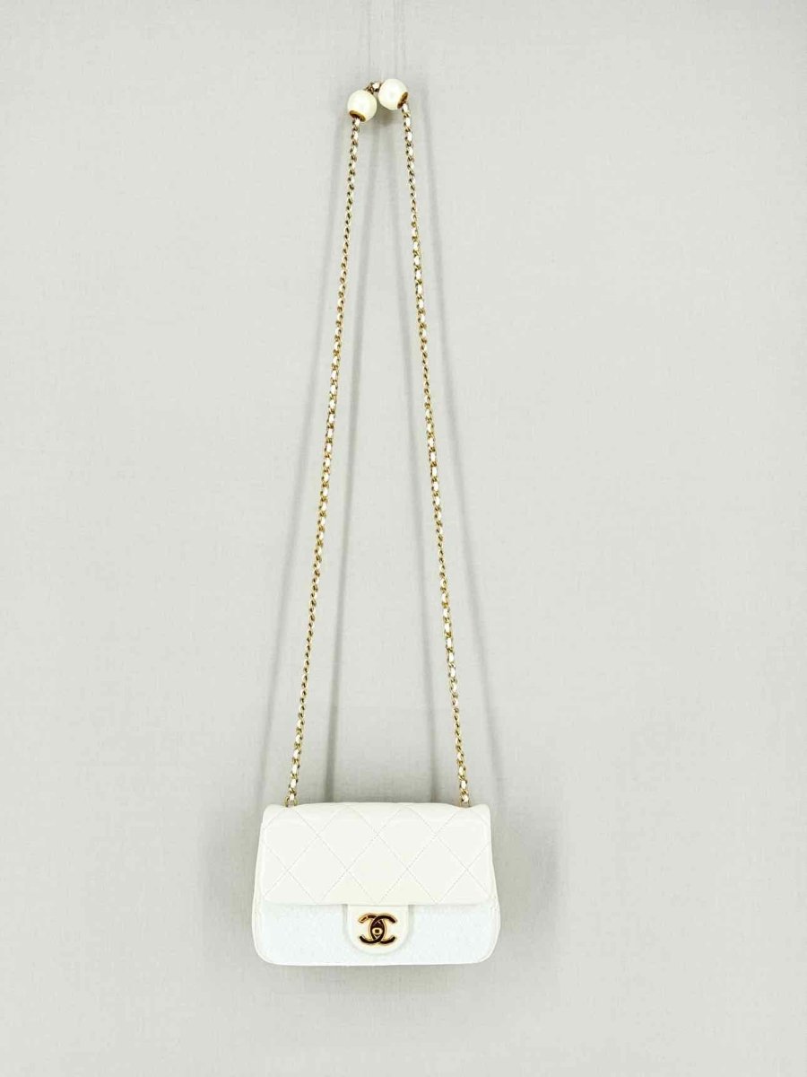 Pre - loved CHANEL White Quilted Crossbody at Reems Closet