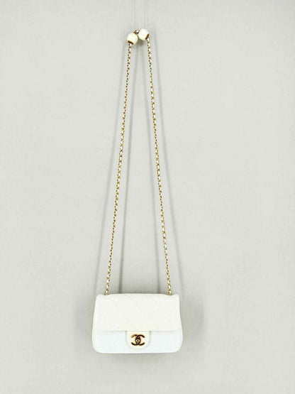 Pre - loved CHANEL White Quilted Crossbody at Reems Closet