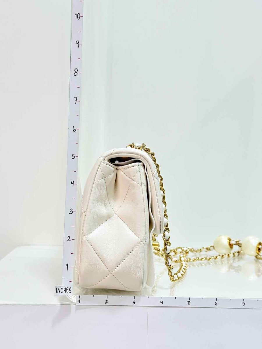 Pre - loved CHANEL White Quilted Crossbody at Reems Closet