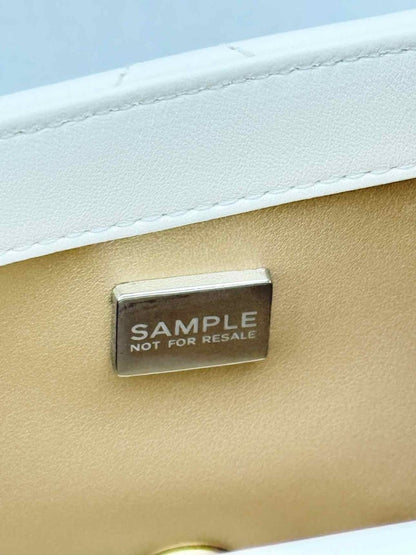 Pre - loved CHANEL White Quilted Crossbody at Reems Closet