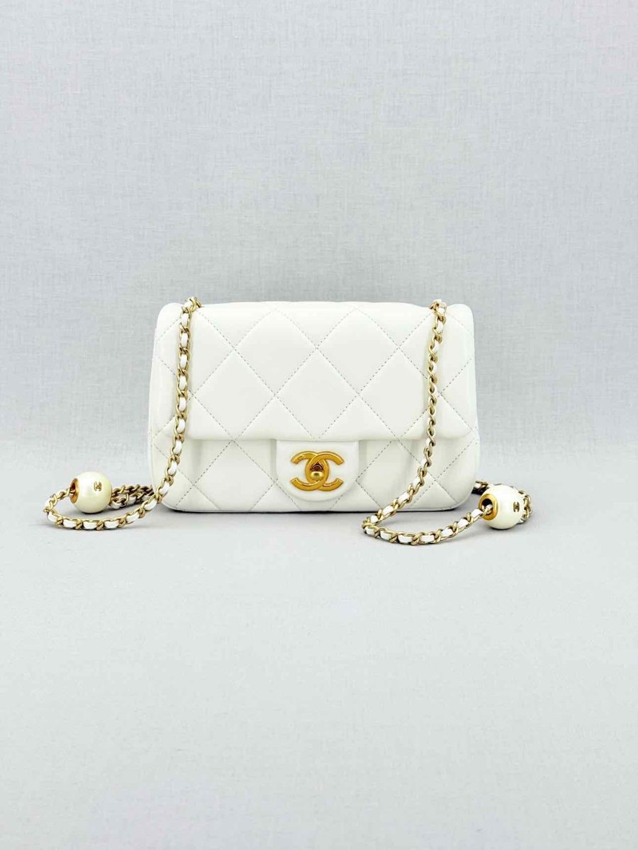 Pre - loved CHANEL White Quilted Crossbody at Reems Closet