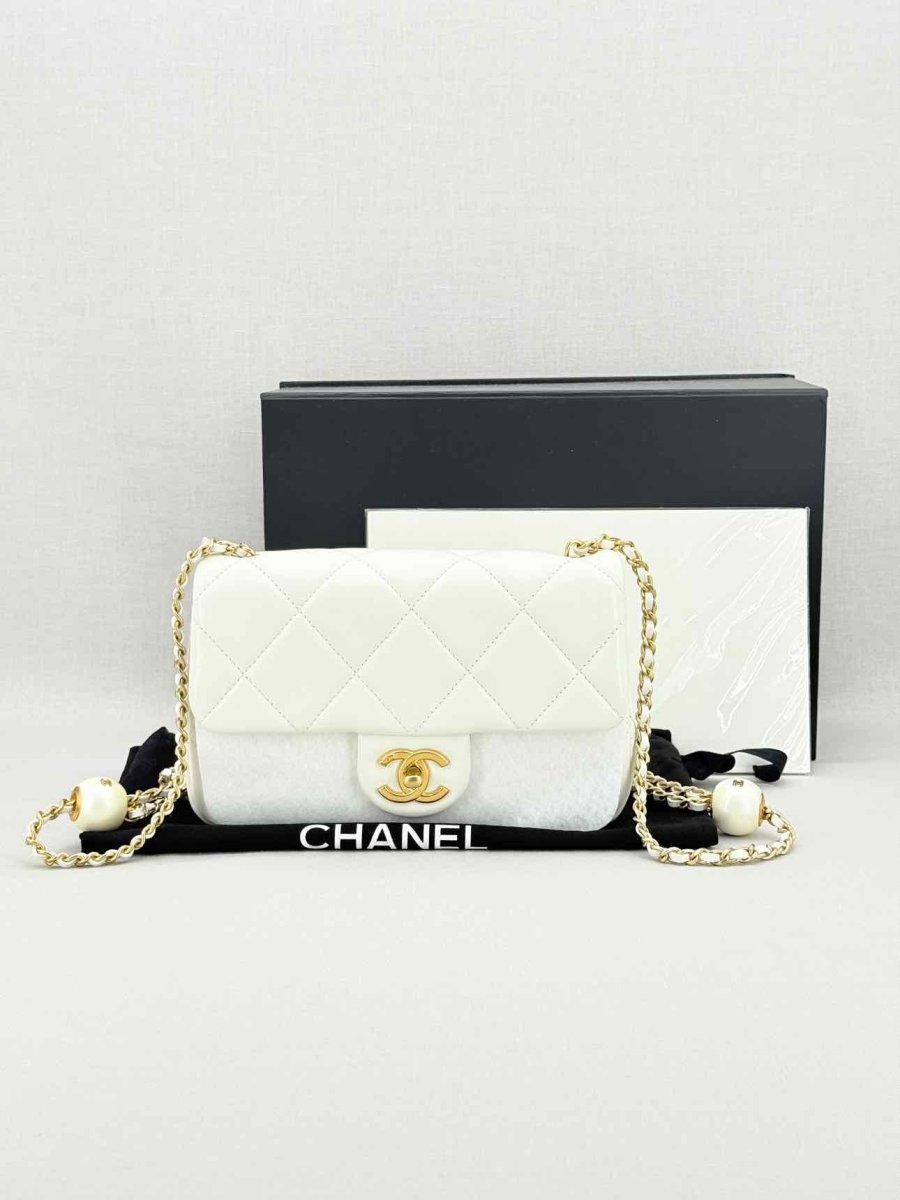 Pre - loved CHANEL White Quilted Crossbody at Reems Closet