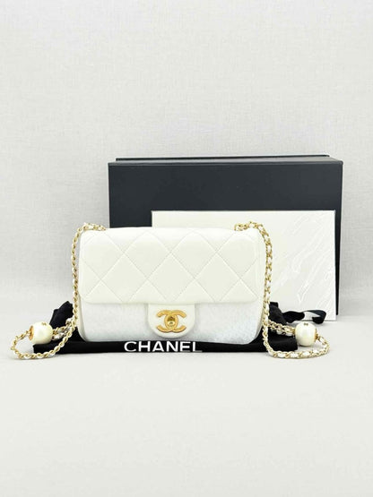 Pre - loved CHANEL White Quilted Crossbody at Reems Closet