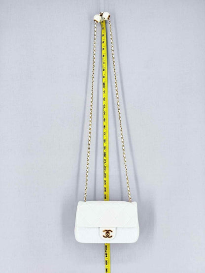 Pre - loved CHANEL White Quilted Crossbody at Reems Closet