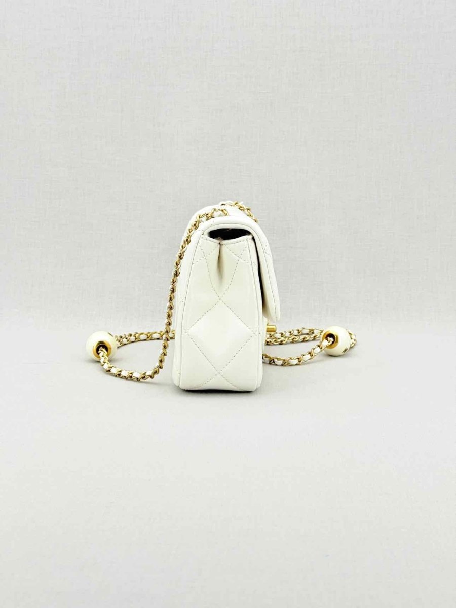 Pre - loved CHANEL White Quilted Crossbody at Reems Closet