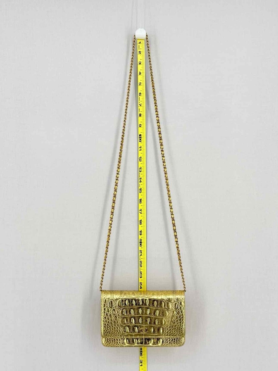 Pre-loved CHANEL WOC Metallic Gold Crocodile Embossed Crossbody at Reems Closet