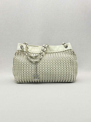 Pre-loved CHANEL Woven White Tote Bag at Reems Closet