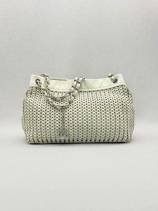 Pre-loved CHANEL Woven White Tote Bag at Reems Closet