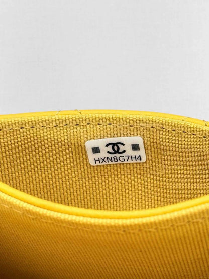 Pre-loved CHANEL Yellow Quilted Compact Wallet at Reems Closet