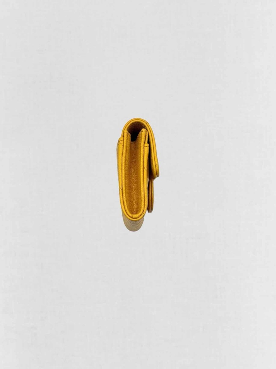 Pre-loved CHANEL Yellow Quilted Compact Wallet at Reems Closet