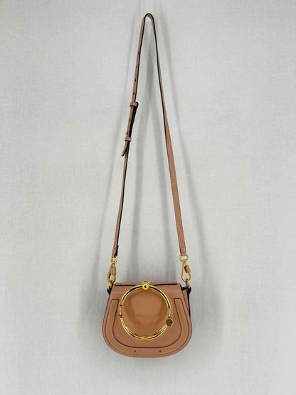 Pre - loved CHLOE Nile Minaudiere Nude Wristlet at Reems Closet