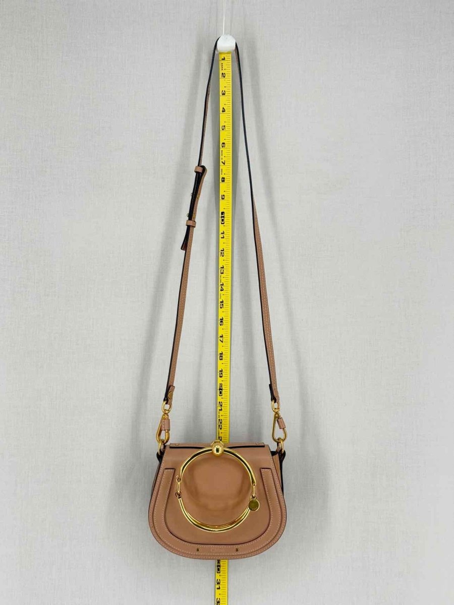 Pre - loved CHLOE Nile Minaudiere Nude Wristlet at Reems Closet