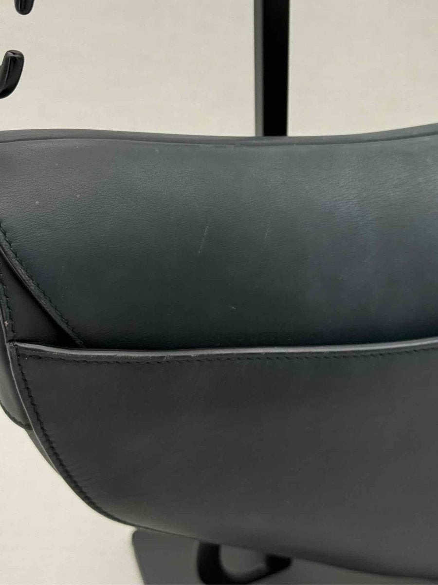 Pre - loved CHRISTIAN DIOR Ultra Matte Black Saddle Bag at Reems Closet