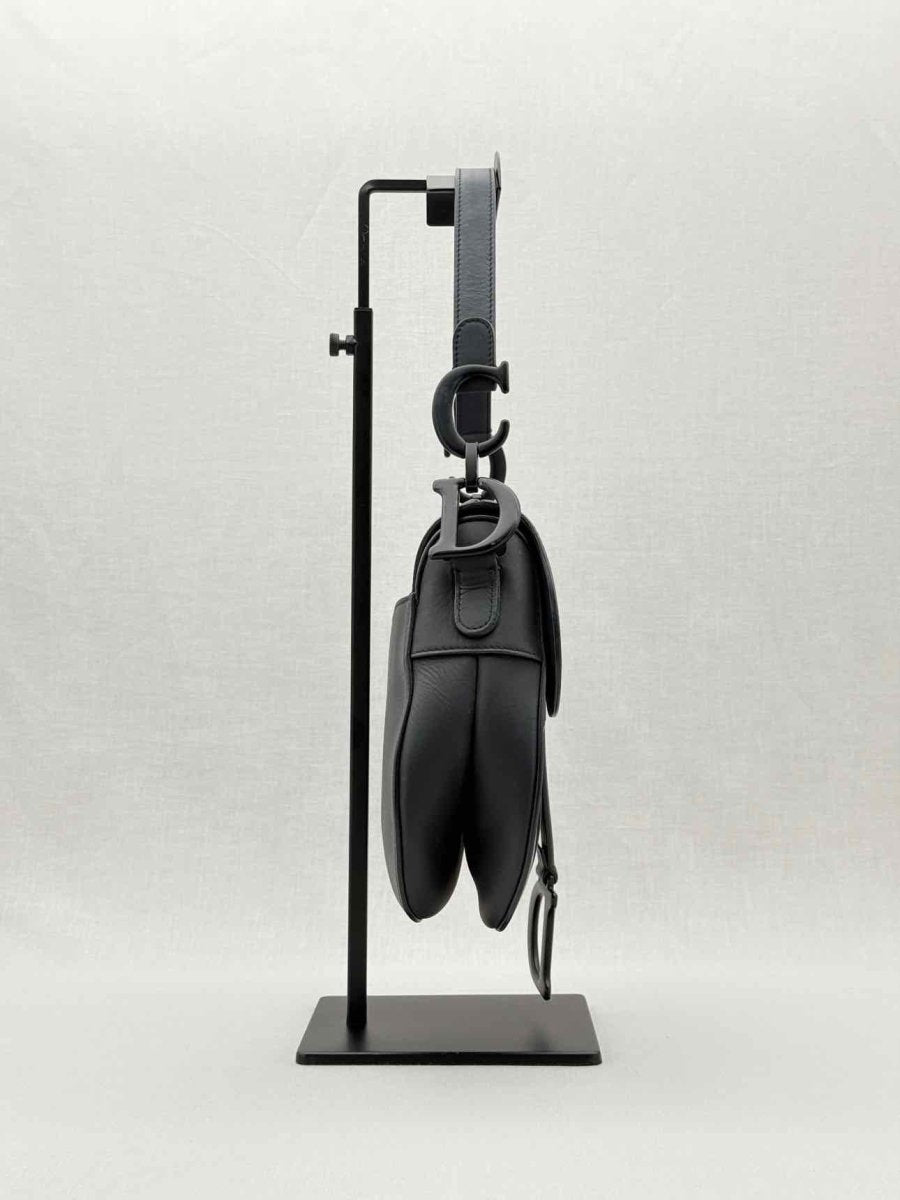 Pre - loved CHRISTIAN DIOR Ultra Matte Black Saddle Bag at Reems Closet